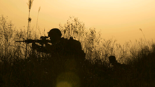 U.S. Marines post security on patrol photo