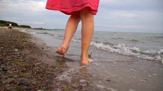 Girl beach barefoot photo