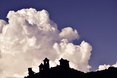 Silhouette of an Antique Roof against the Sky photo