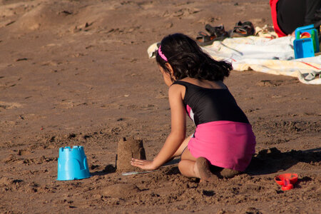 Little Girl Sand Castle photo