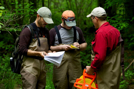 FWS employees surveying and assessing rivers and streams-1 photo