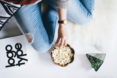Woman Eating Popcorn photo