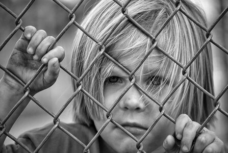 Chain link young child photo
