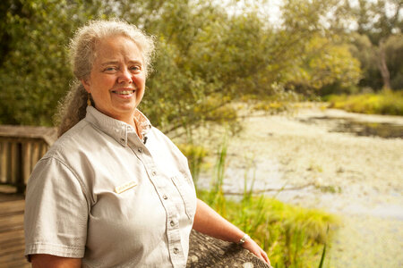 Employee on a dock at Nisqually National Wildlife Refuge