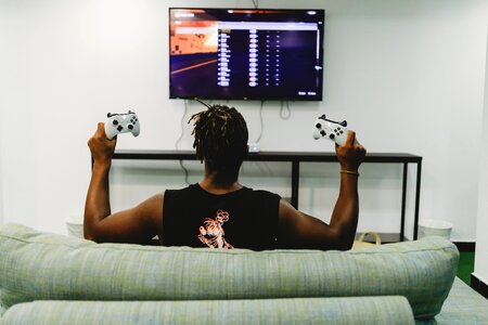 Man playing video game photo