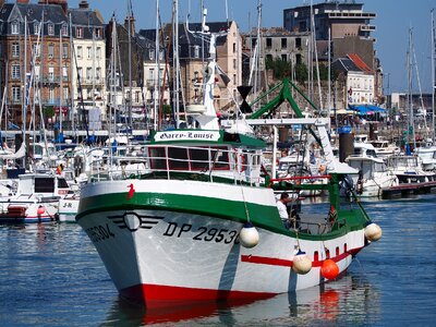 Colorful buildings and boats within a Port photo