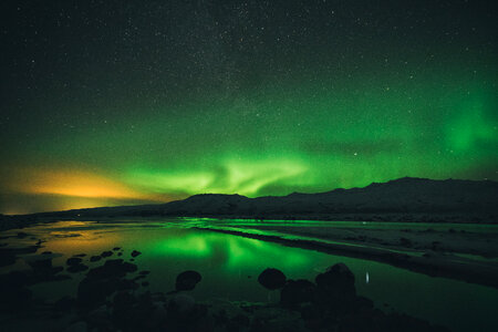Beautiful Lights Aurora Borealis over Lake photo