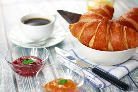 Croissants in a bowl with Jam for breakfast or snack photo