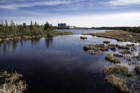 Buildings and landscape across Niven Lake in Yellowknife