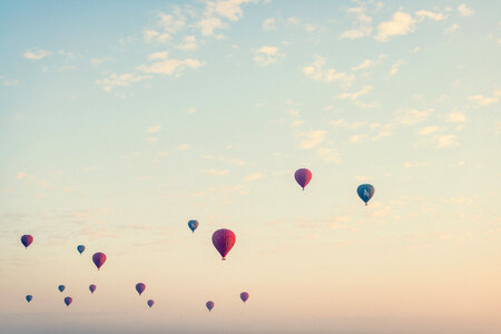 Hot Air Balloon Is Flying at Sunrise