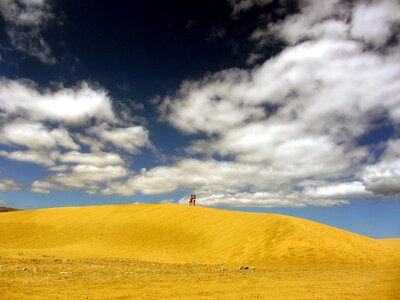 Sand sky clouds