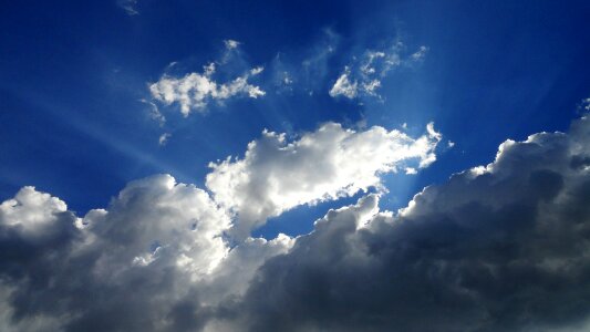 Clouds blue sky sun photo