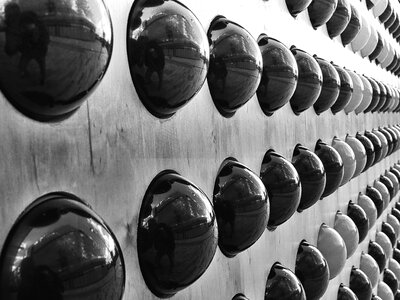 Ball-Shaped black and white distorted shape photo