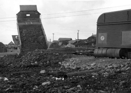 Carriage discharge earth