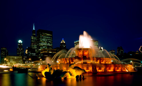 Chicago Fountain and skyline at night photo