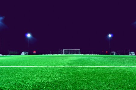 Empty Night Football Field in the Lights photo