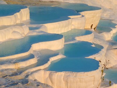 Pamukkale contains hot springs and travertines, terraces