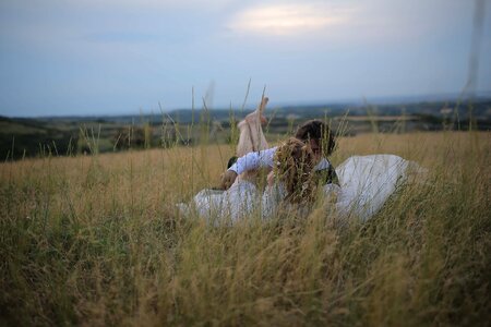 Girl kiss grass photo