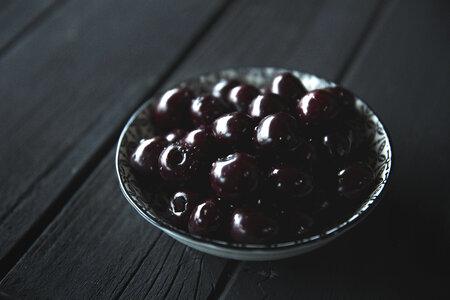 Black cherries in a bowl photo