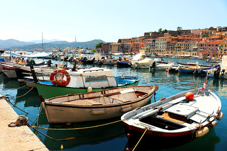 Sea harbor in a small town with small ships photo