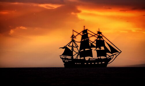 Sailing vessel ship sunset photo