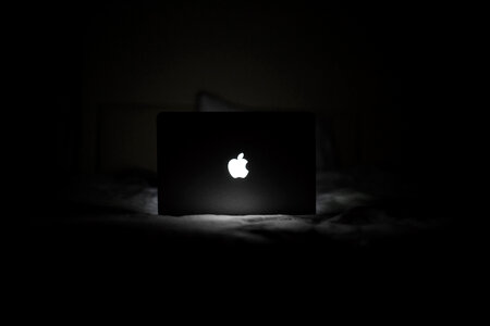 Macbook bed black and white photo