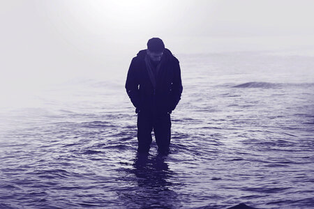Man in Ocean Water photo