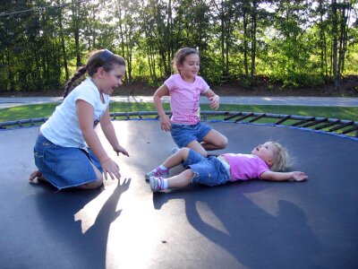 Children girls jumping photo