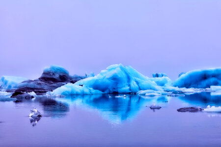 Blue Icebergs on the water photo