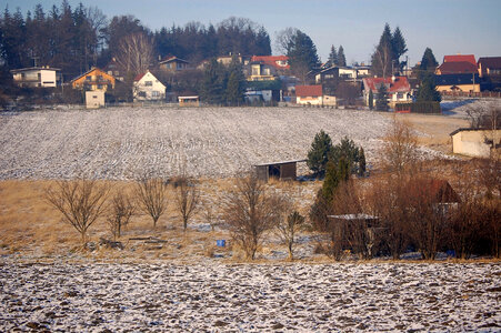 Houses and farms in the distance in the polish countryside photo