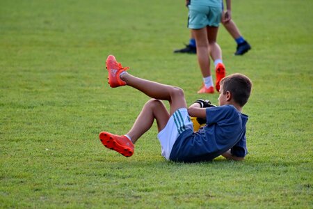 Child defensive football player photo