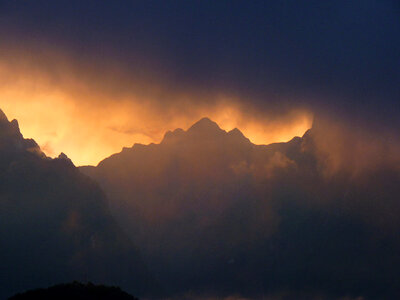 Sunset and Dusk over the Mountains in Machu Picchu, Peru photo