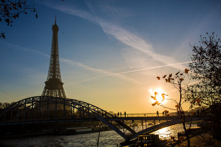 Sunset over Seine in Paris with Eiffel Tower in Autumn Time photo