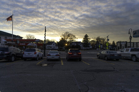 Parking Lot sunset under cloudy skies photo