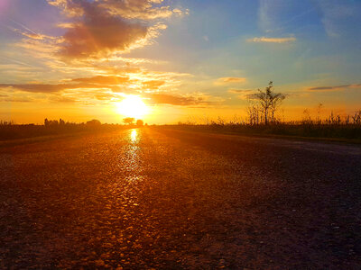 Sunshine over the road and sky photo