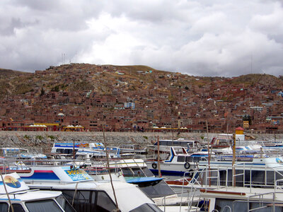 Puno cityscape and marina on Lake Titicaca in Peru photo