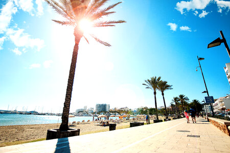 Promenade in a sunny day with beautiful blue sky photo