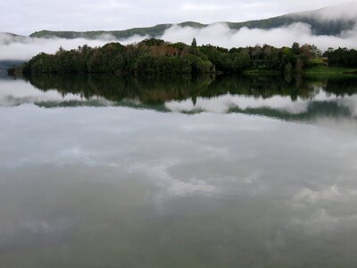 Clouds grey volcanic lake photo