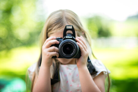 Child Using Camera photo