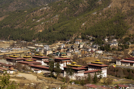 Town at the bottom of the Mountain in Bhutan photo