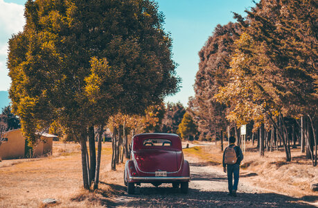 Old Classic Car on a Gravel Road photo