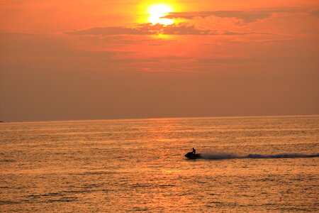 Sunset boat sea photo