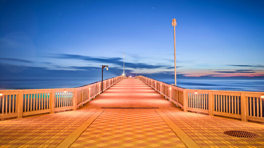 Bridge Walkway over the Ocean in Panama City, Florida photo