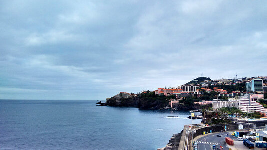 Coastline landscape and city in Funchal, Portugal photo