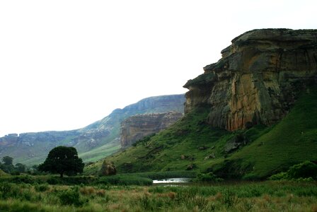 Cliff green slopes soft light photo