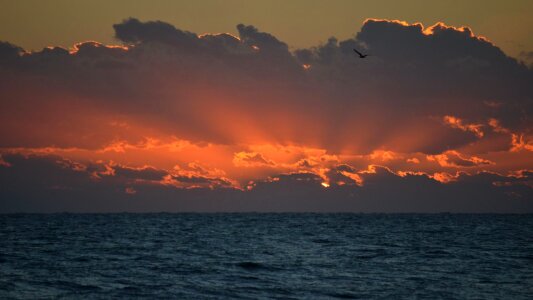 Ocean sunrise clouds photo