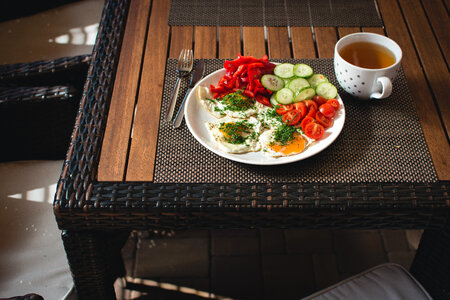 Paleo breakfast eggs with vegetables outside photo