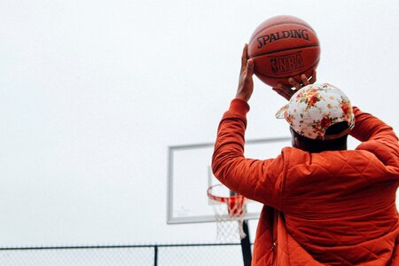 Man shooting basketball photo