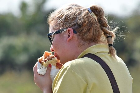 Eating hamburger sandwich photo