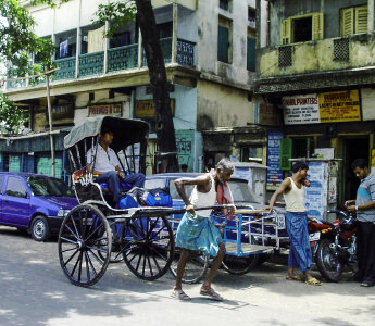 Riksha in the road in Calcutta, India photo